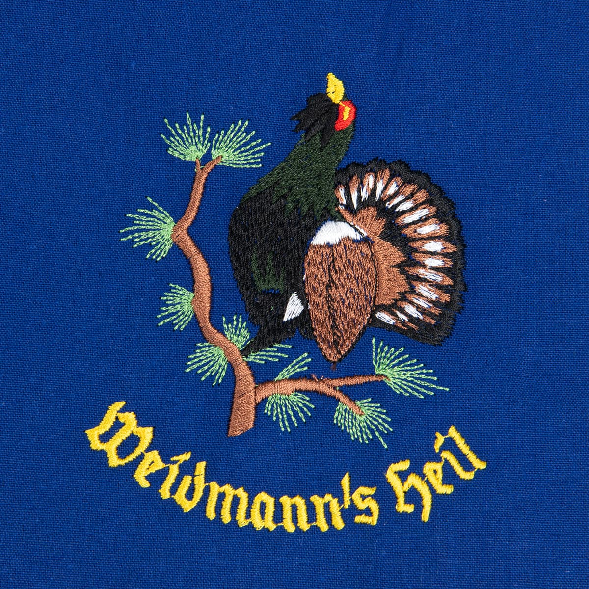 Tablier bleu avec motif : Weidmann`s Heil