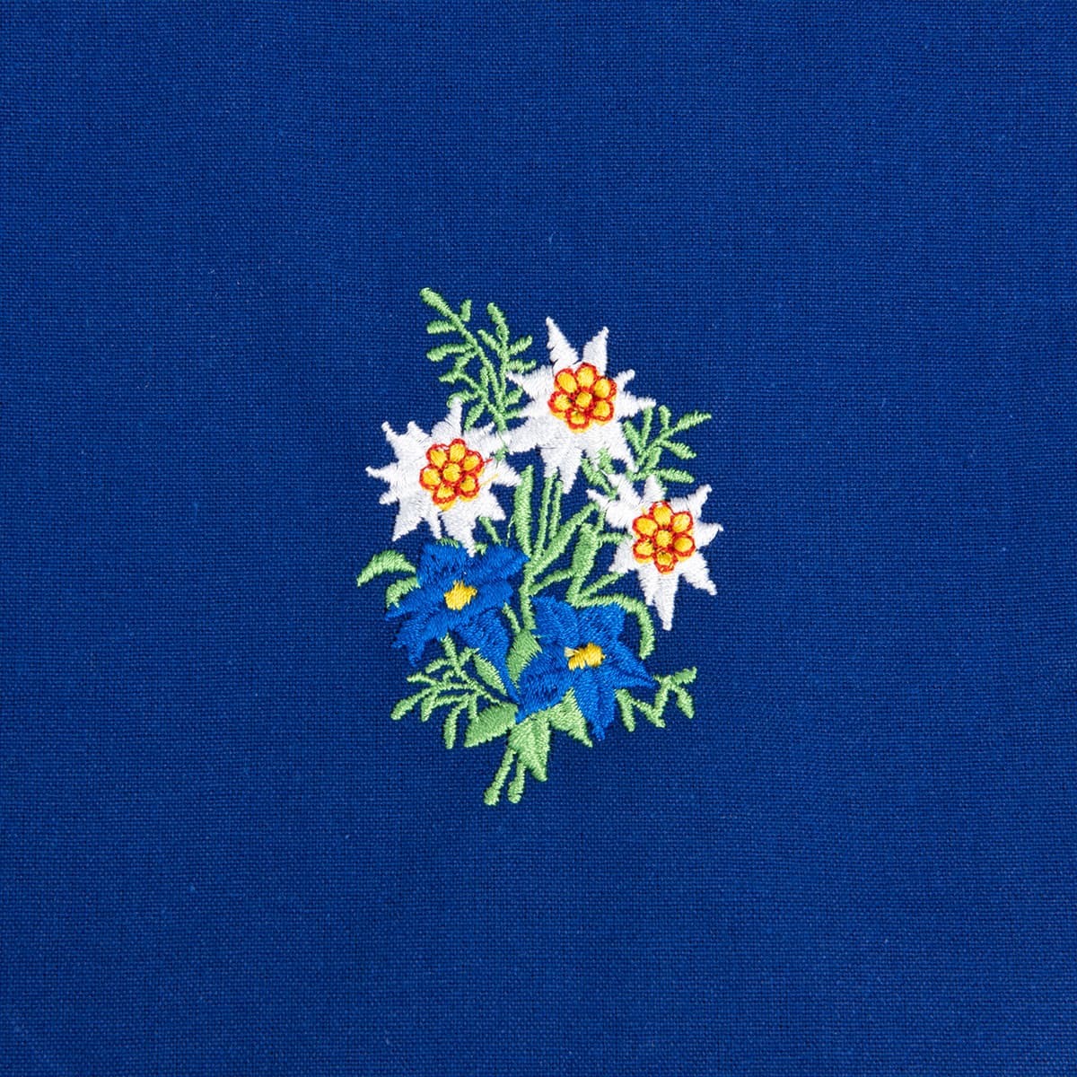 Tablier bleu avec motif : bouquet de fleurs