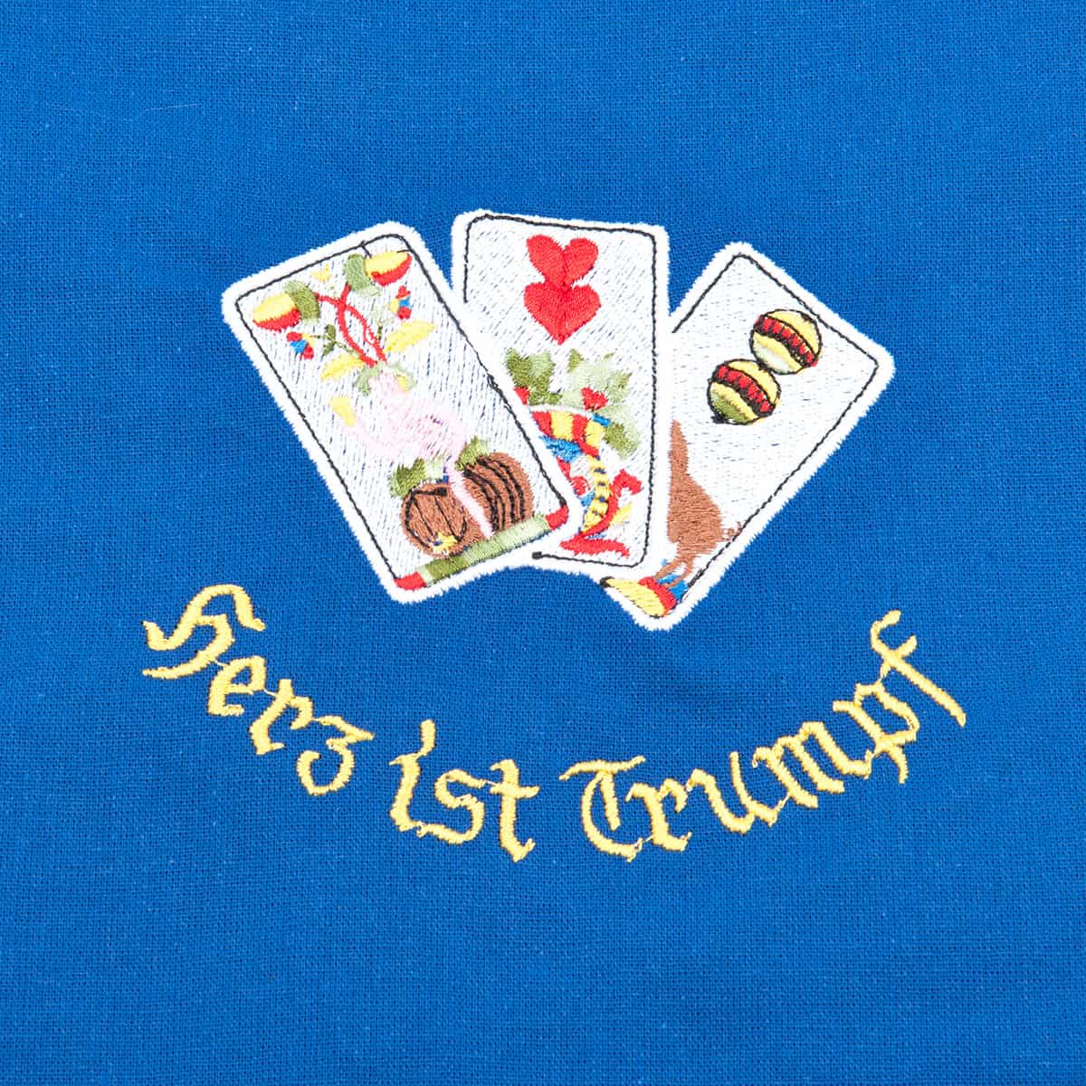 Tablier bleu avec motif "Herz ist Trumpf&quot ;