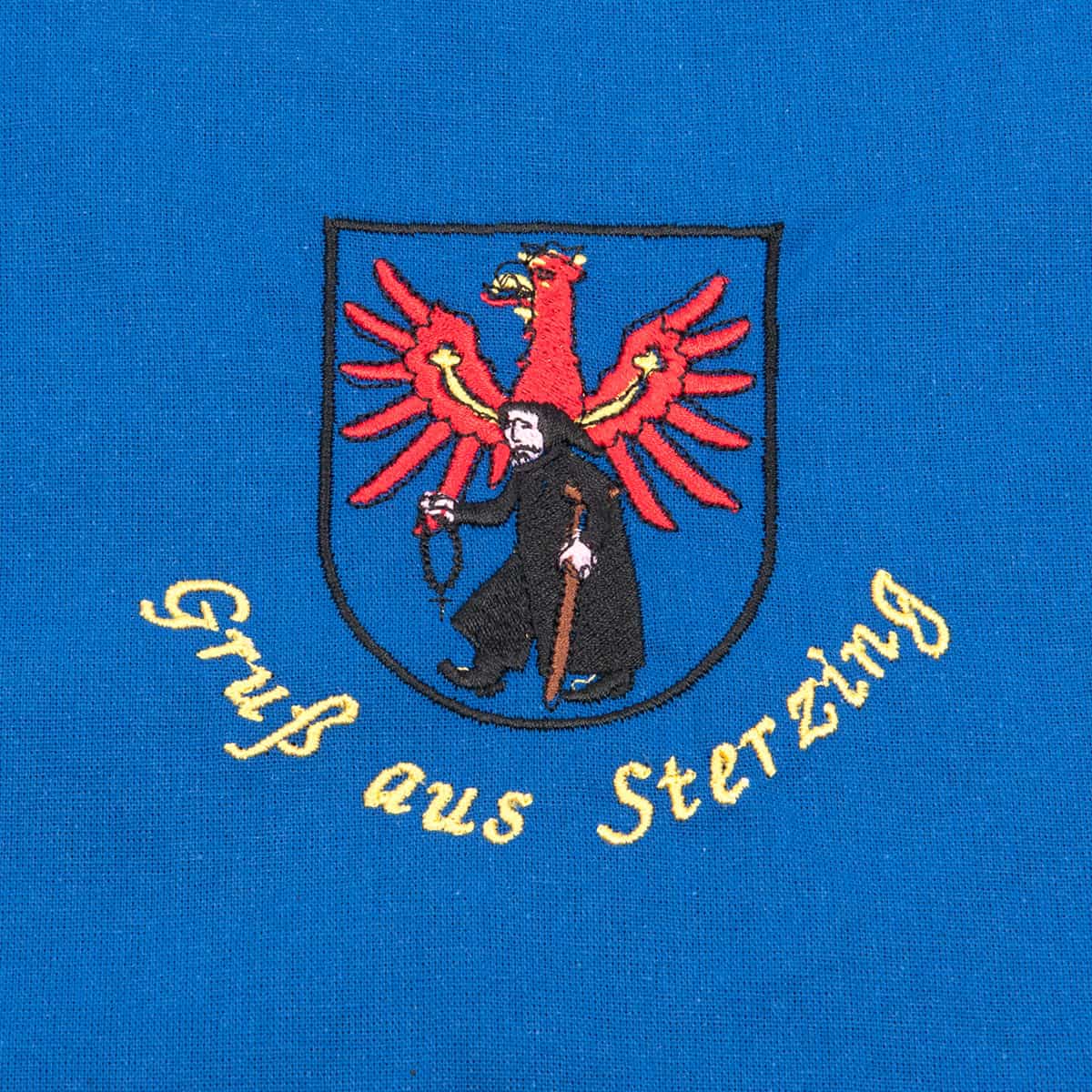 Tablier bleu avec motif "Salutations de Sterzing&quot ;